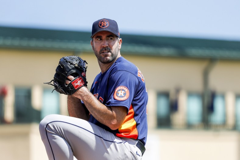Mar 18, 2022; Jupiter, Florida, USA; Houston Astros starting pitcher Justin Verlander (35) delivers a pitch from the bullpen prior to the game against the St. Louis Cardinals during spring training at Roger Dean Stadium. Mandatory Credit: Sam Navarro-USA TODAY Sports