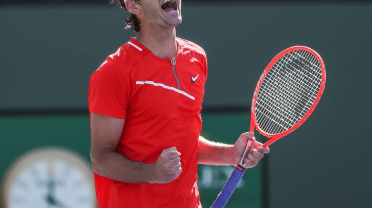 Taylor Fritz celebrates his quarterfinal win over Miomir Kecmanovic during the BNP Paribas Open in Indian Wells, Calif., March 18, 2022.Bnp Quarterfinals Friday 27