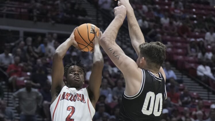 Mar 18, 2022; San Diego, CA, USA; Arizona Wildcats guard Adama Bal (2) shoots the basketball against Wright State Raiders forward Grant Basile (00) during the first half during the first round of the 2022 NCAA Tournament at Viejas Arena. Mandatory Credit: Kirby Lee-USA TODAY Sports