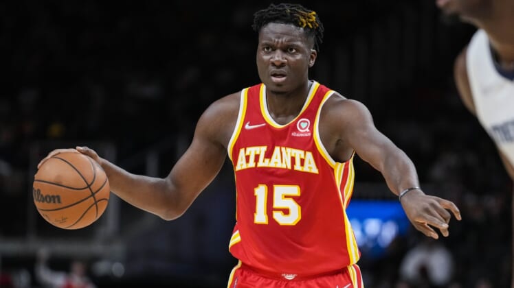 Mar 18, 2022; Atlanta, Georgia, USA; Atlanta Hawks center Clint Capela (15) directs his teammates against the Memphis Grizzlies during the first half at State Farm Arena. Mandatory Credit: Dale Zanine-USA TODAY Sports
