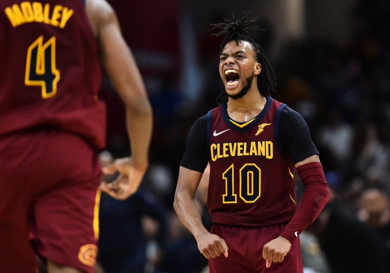 Mar 18, 2022; Cleveland, Ohio, USA;  Cleveland Cavaliers guard Darius Garland (10) reacts after a basket during overtime against the Denver Nuggets at Rocket Mortgage FieldHouse. Mandatory Credit: Ken Blaze-USA TODAY Sports