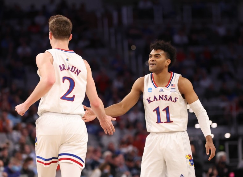 Mar 19, 2022; Fort Worth, TX, USA; Kansas Jayhawks guard Remy Martin (11) and Kansas Jayhawks guard Christian Braun (2) celebrate against the Creighton Bluejays during the second round of the 2022 NCAA Tournament at Dickies Arena. Mandatory Credit: Kevin Jairaj-USA TODAY Sports