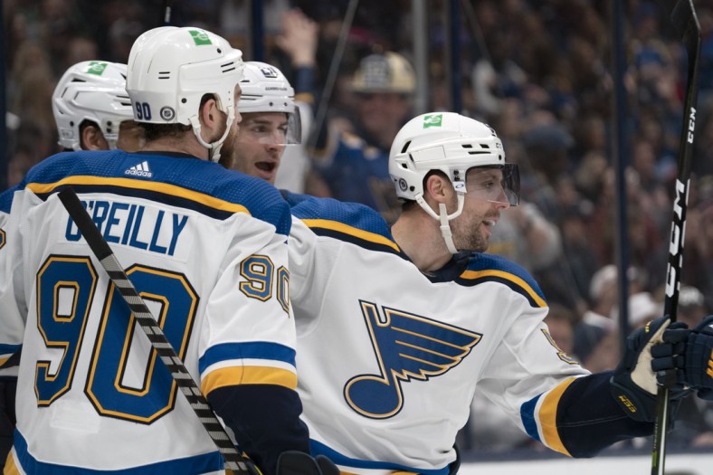 Mar 19, 2022; Columbus, Ohio, USA;  St. Louis Blues left wing David Perron (57) celebrates a goal during the game against the Columbus Blue Jackets at Nationwide Arena. Mandatory Credit: Jason Mowry-USA TODAY Sports
