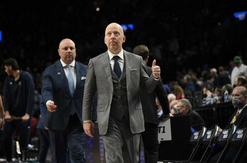 Mar 19, 2022; Portland, OR, USA; UCLA Bruins head coach Mick Cronin celebrates beating St. Mary's Gaels 72-56 in the second round of the 2022 NCAA Tournament at Moda Center. Mandatory Credit: Troy Wayrynen-USA TODAY Sports