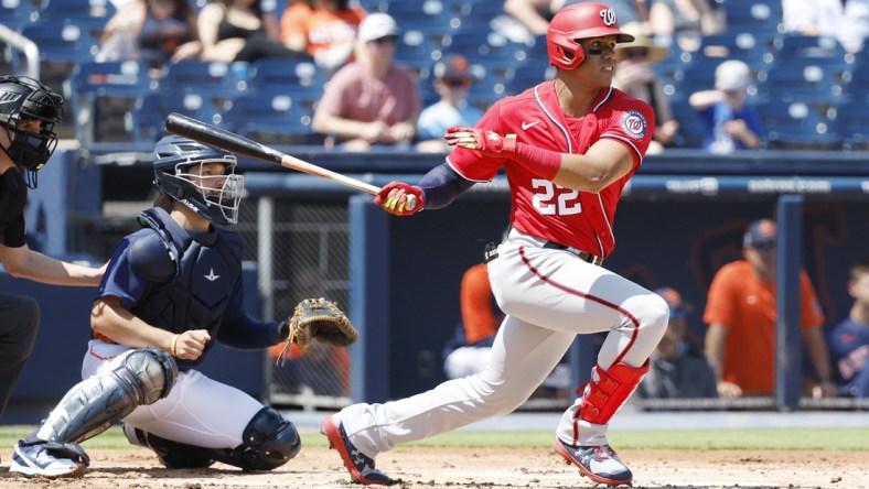 Mar 20, 2022; West Palm Beach, Florida, USA; Washington Nationals right fielder Juan Soto (22) bats in the first inning during spring training at The Ballpark of the Palm Beaches. Mandatory Credit: Rhona Wise-USA TODAY Sports