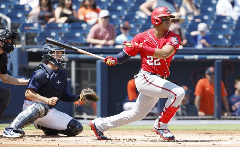 Mar 20, 2022; West Palm Beach, Florida, USA; Washington Nationals right fielder Juan Soto (22) bats in the first inning during spring training at The Ballpark of the Palm Beaches. Mandatory Credit: Rhona Wise-USA TODAY Sports