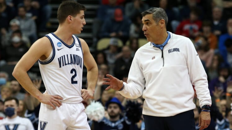 Mar 20, 2022; Pittsburgh, PA, USA;  Villanova Wildcats head coach Jay Wright talks with guard Collin Gillespie (2) in the first half during the second round of the 2022 NCAA Tournament at PPG Paints Arena. Mandatory Credit: Charles LeClaire-USA TODAY Sports