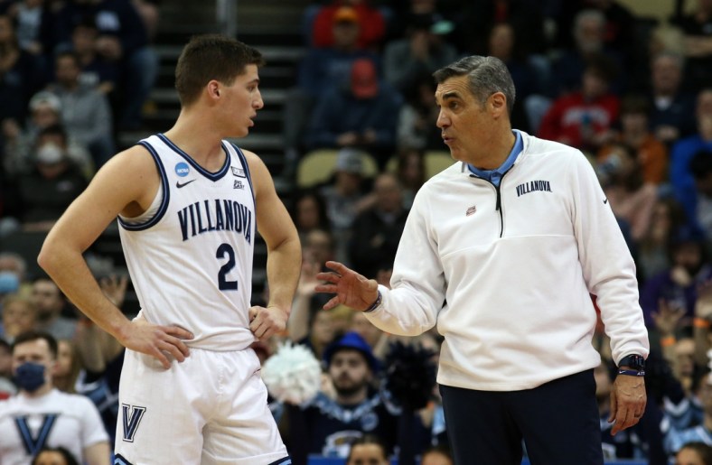 Mar 20, 2022; Pittsburgh, PA, USA;  Villanova Wildcats head coach Jay Wright talks with guard Collin Gillespie (2) in the first half during the second round of the 2022 NCAA Tournament at PPG Paints Arena. Mandatory Credit: Charles LeClaire-USA TODAY Sports