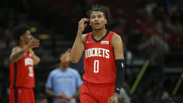Mar 20, 2022; Houston, Texas, USA; Houston Rockets guard Jalen Green (0) reacts after a play during the first quarter against the Memphis Grizzlies at Toyota Center. Mandatory Credit: Troy Taormina-USA TODAY Sports