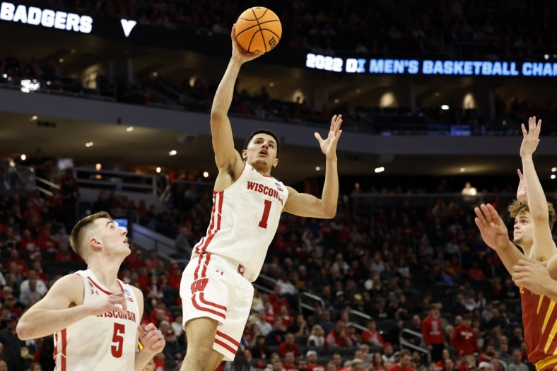 Mar 20, 2022; Milwaukee, WI, USA; Wisconsin Badgers guard Johnny Davis (1) shoots the ball during the second half against the Iowa State Cyclones in the second round of the 2022 NCAA Tournament at Fiserv Forum. Mandatory Credit: Jeff Hanisch-USA TODAY Sports