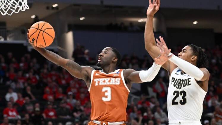 Mar 20, 2022; Milwaukee, WI, USA; Texas Longhorns guard Courtney Ramey (3) shoots the ball during the first half against Purdue Boilermakers guard Jaden Ivey (23) in the second round of the 2022 NCAA Tournament at Fiserv Forum. Mandatory Credit: Benny Sieu-USA TODAY Sports