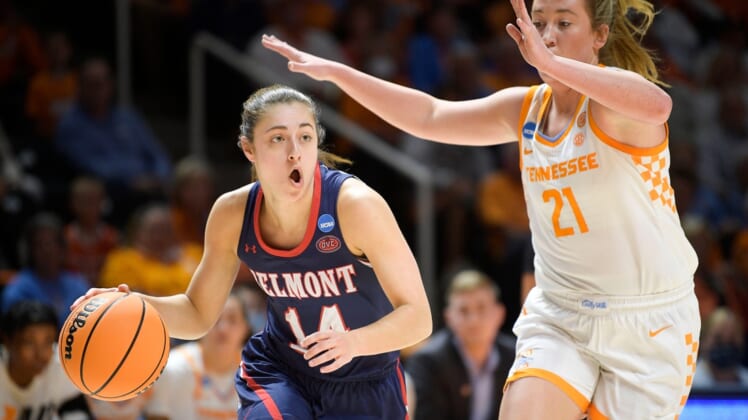Belmont guard Jamilyn Kinney (14) dribbles the ball as Tennessee guard/forward Tess Darby (21) defends during a second round NCAA Division I Women's Basketball Championship game between No. 4 Tennessee and No. 12 Belmont at Thompson-Boling Arena in Knoxville, Tenn. on Monday, March 21, 2022.Kns Ncaa Lady Vols Belmont RANK 7