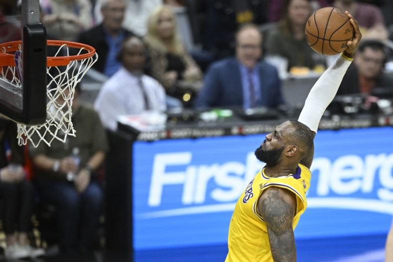 Mar 21, 2022; Cleveland, Ohio, USA; Los Angeles Lakers forward LeBron James (6) dunks in the fourth quarter against the Cleveland Cavaliers at Rocket Mortgage FieldHouse. Mandatory Credit: David Richard-USA TODAY Sports