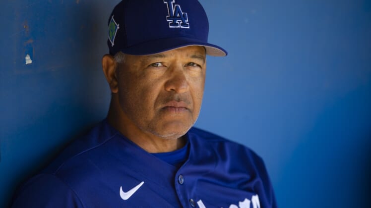 Mar 22, 2022; Phoenix, Arizona, USA; Los Angeles Dodgers manager Dave Roberts against the Cincinnati Reds during a spring training game at Camelback Ranch-Glendale. Mandatory Credit: Mark J. Rebilas-USA TODAY Sports