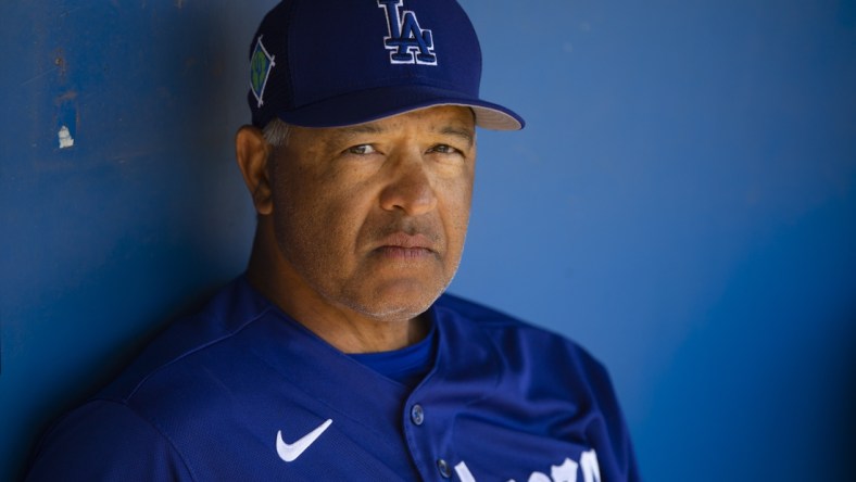 Mar 22, 2022; Phoenix, Arizona, USA; Los Angeles Dodgers manager Dave Roberts against the Cincinnati Reds during a spring training game at Camelback Ranch-Glendale. Mandatory Credit: Mark J. Rebilas-USA TODAY Sports