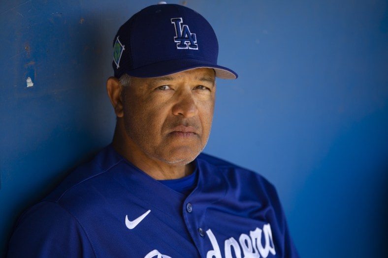 Mar 22, 2022; Phoenix, Arizona, USA; Los Angeles Dodgers manager Dave Roberts against the Cincinnati Reds during a spring training game at Camelback Ranch-Glendale. Mandatory Credit: Mark J. Rebilas-USA TODAY Sports