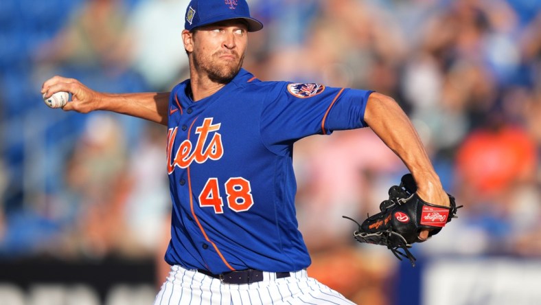 Mar 22, 2022; Port St. Lucie, Florida, USA; New York Mets starting pitcher Jacob deGrom (48) delivers a pitch in the first inning of the spring training game against the Houston Astros at Clover Park. Mandatory Credit: Jasen Vinlove-USA TODAY Sports