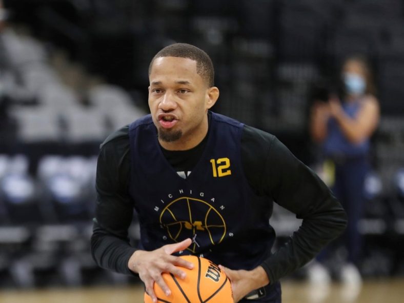 Michigan guard DeVante' Jones goes through drills during practice for the Sweet 16 game against Villanova on Wednesday, March 23, 2022, at the AT&T Center in San Antonio.Michigan Vill1