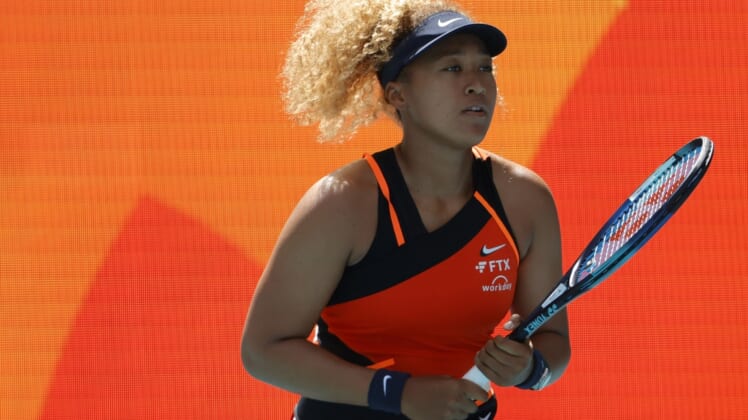 Mar 23, 2022; Miami Gardens, FL, USA; Naomi Osaka (JPN) warms up prior to her match against Astra Sharma (AUS) (not pictured) in a first round women's singles match in the Miami Open at Hard Rock Stadium. Mandatory Credit: Geoff Burke-USA TODAY Sports