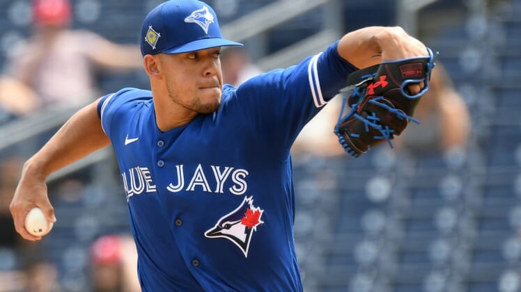 Mar 23, 2022; Clearwater, Florida, USA; Toronto Blue Jays pitcher Jose Berrios (17) throws a pitch in the first inning of the game against the Philadelphia Phillies during spring training at BayCare Ballpark. Mandatory Credit: Jonathan Dyer-USA TODAY Sports