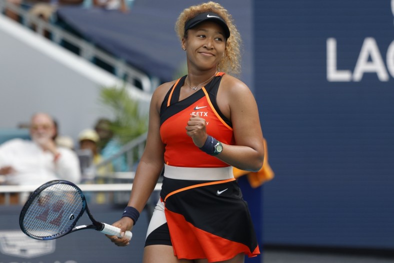 Mar 24, 2022; Miami Gardens, FL, USA; Naomi Osaka (JPN) reacts after match point against Angelique Kerber (GER) (not pictured) in a second round women's singles match in the Miami Open at Hard Rock Stadium. Mandatory Credit: Geoff Burke-USA TODAY Sports