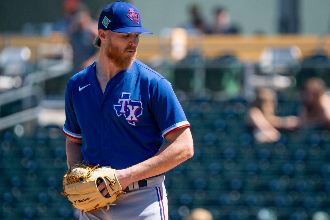 Mar 24, 2022; Mesa, Arizona, USA; Texas Rangers pitcher Jon Gray (22) on the mound in the first inning during a spring training game against the Oakland Athletics at Hohokam Stadium. Mandatory Credit: Allan Henry-USA TODAY Sports