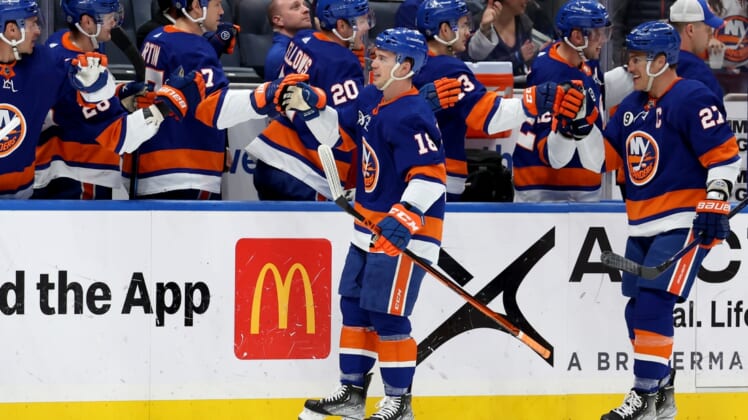 Mar 24, 2022; Elmont, New York, USA; New York Islanders left wing Anthony Beauvillier (18) celebrates his goal against the Detroit Red Wings with teammates during the first period at UBS Arena. Mandatory Credit: Brad Penner-USA TODAY Sports