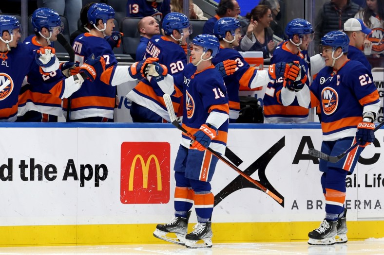 Mar 24, 2022; Elmont, New York, USA; New York Islanders left wing Anthony Beauvillier (18) celebrates his goal against the Detroit Red Wings with teammates during the first period at UBS Arena. Mandatory Credit: Brad Penner-USA TODAY Sports