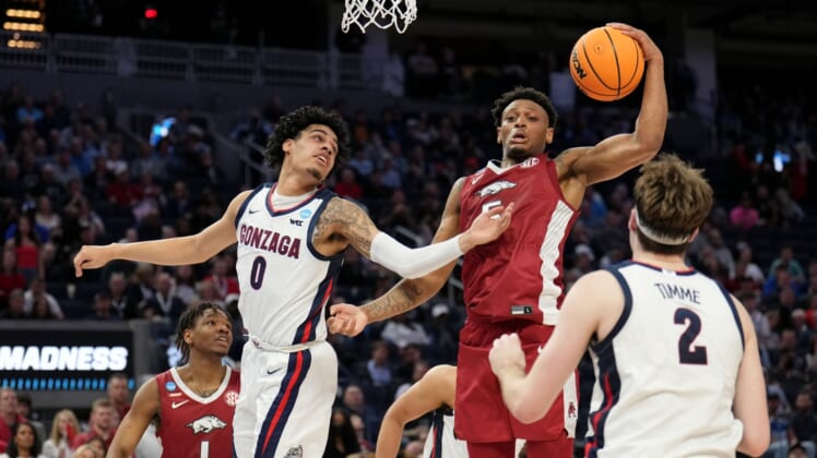 Mar 24, 2022; San Francisco, CA, USA; Arkansas Razorbacks guard Au'Diese Toney (5) grabs a rebound against Gonzaga Bulldogs guard Julian Strawther (0) during the first half in the semifinals of the West regional of the men's college basketball NCAA Tournament at Chase Center. Mandatory Credit: Kelley L Cox-USA TODAY Sports