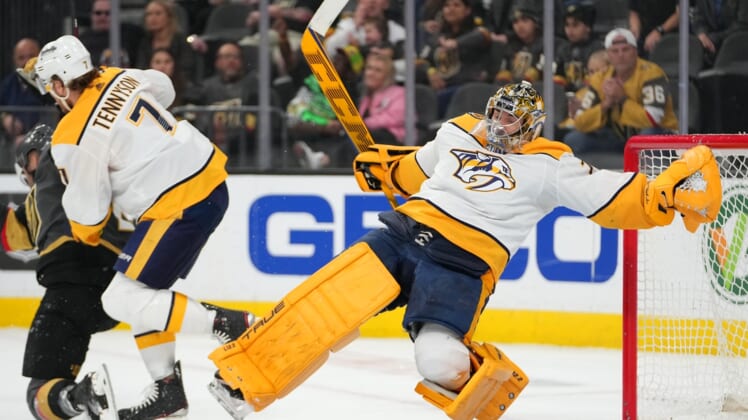 Mar 24, 2022; Las Vegas, Nevada, USA; Nashville Predators goaltender Juuse Saros (74) loses an edge in a game against the Vegas Golden Knights during the second period at T-Mobile Arena. Mandatory Credit: Stephen R. Sylvanie-USA TODAY Sports