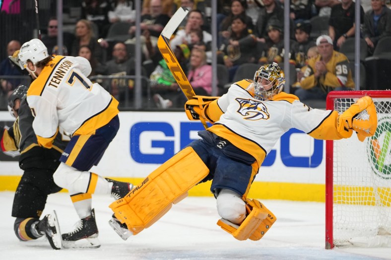Mar 24, 2022; Las Vegas, Nevada, USA; Nashville Predators goaltender Juuse Saros (74) loses an edge in a game against the Vegas Golden Knights during the second period at T-Mobile Arena. Mandatory Credit: Stephen R. Sylvanie-USA TODAY Sports