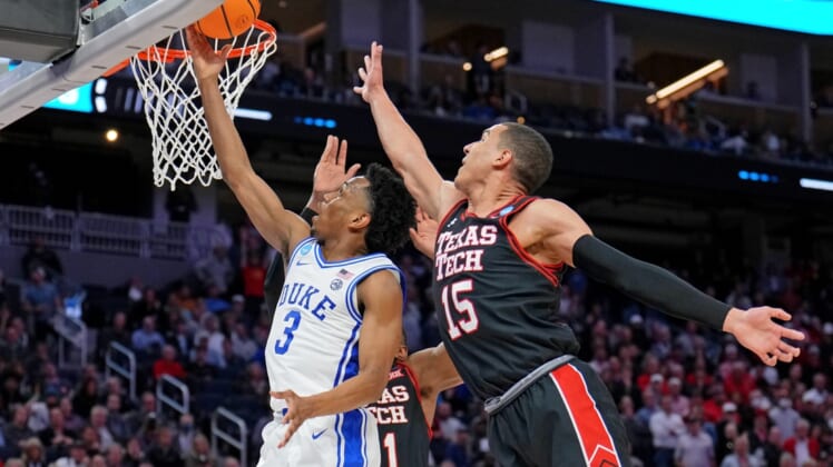 Mar 24, 2022; San Francisco, CA, USA; Duke Blue Devils guard Jeremy Roach (3) shoots the ball against Texas Tech Red Raiders forward Bryson Williams (back) and guard Kevin McCullar (15) during the second half in the semifinals of the West regional of the men's college basketball NCAA Tournament at Chase Center. Mandatory Credit: Kelley L Cox-USA TODAY Sports