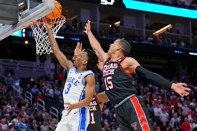 Mar 24, 2022; San Francisco, CA, USA; Duke Blue Devils guard Jeremy Roach (3) shoots the ball against Texas Tech Red Raiders forward Bryson Williams (back) and guard Kevin McCullar (15) during the second half in the semifinals of the West regional of the men's college basketball NCAA Tournament at Chase Center. Mandatory Credit: Kelley L Cox-USA TODAY Sports