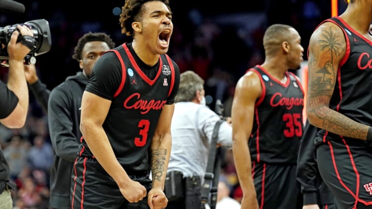 Mar 24, 2022; San Antonio, TX, USA; Houston Cougars guard Ramon Walker Jr. (3) celebrates after beating the Arizona Wildcats in the semifinals of the South regional of the men's college basketball NCAA Tournament at AT&T Center. Mandatory Credit: Scott Wachter-USA TODAY Sports