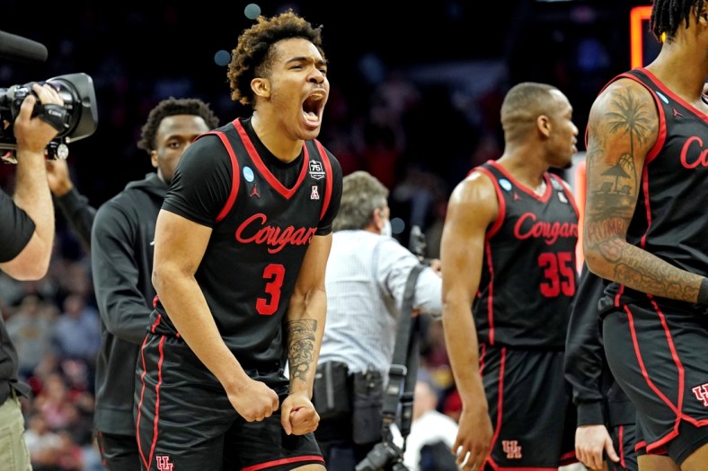 Mar 24, 2022; San Antonio, TX, USA; Houston Cougars guard Ramon Walker Jr. (3) celebrates after beating the Arizona Wildcats in the semifinals of the South regional of the men's college basketball NCAA Tournament at AT&T Center. Mandatory Credit: Scott Wachter-USA TODAY Sports