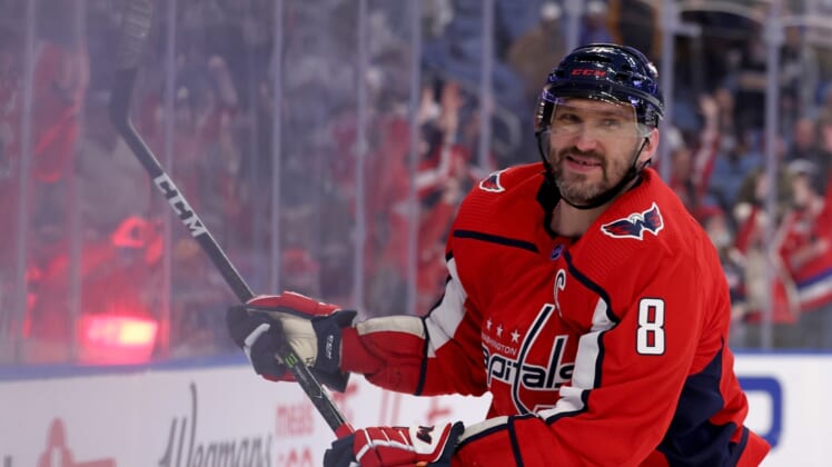 Mar 25, 2022; Buffalo, New York, USA;  Washington Capitals left wing Alex Ovechkin (8) celebrates his game winning goal during a shootout against the Buffalo Sabres at KeyBank Center. Mandatory Credit: Timothy T. Ludwig-USA TODAY Sports