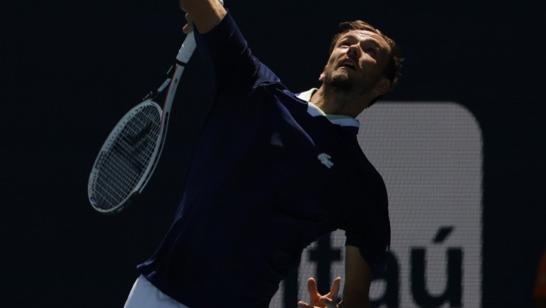 Mar 26, 2022; Miami Gardens, FL, USA; Daniil Medvedev serves against Andy Murray (GBR) (not pictured) in a second round men's singles match in the Miami Open at Hard Rock Stadium. Mandatory Credit: Geoff Burke-USA TODAY Sports