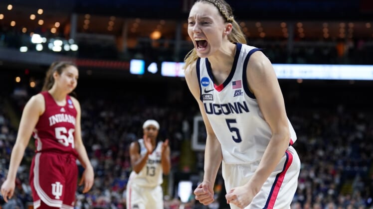Mar 26, 2022; Bridgeport, CT, USA; UConn Huskies guard Paige Bueckers (5) reacts after a play against the Indiana Hoosiers during the first half in the Bridgeport regional semifinals of the women's college basketball NCAA Tournament at Webster Bank Arena. Mandatory Credit: David Butler II-USA TODAY Sports