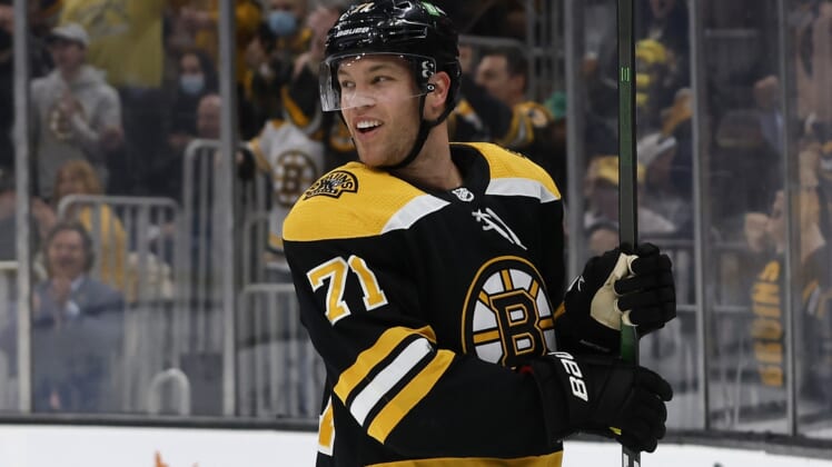 Mar 26, 2022; Boston, Massachusetts, USA; Boston Bruins left wing Taylor Hall (71) smiles after scoring a goal against the New York Islanders during the first period at TD Garden. Mandatory Credit: Winslow Townson-USA TODAY Sports
