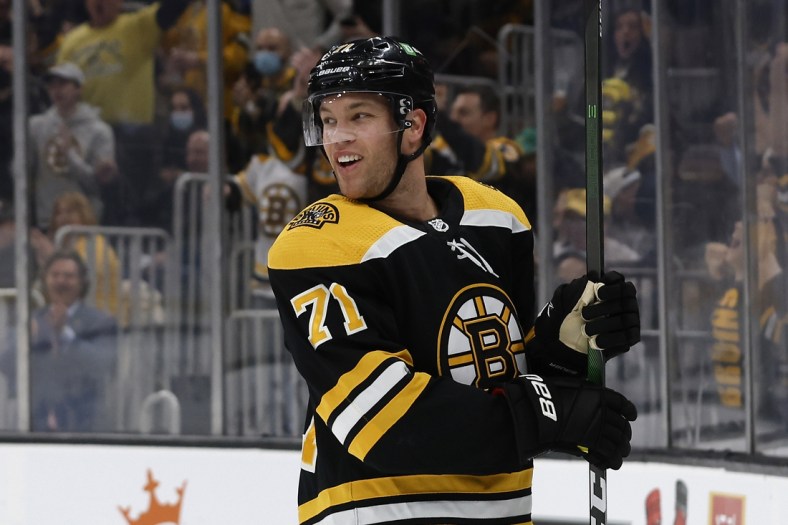 Mar 26, 2022; Boston, Massachusetts, USA; Boston Bruins left wing Taylor Hall (71) smiles after scoring a goal against the New York Islanders during the first period at TD Garden. Mandatory Credit: Winslow Townson-USA TODAY Sports