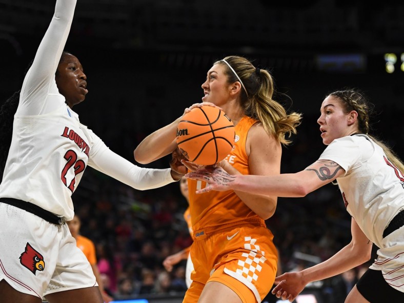 Tennessee forward Karoline Striplin (11) tried to get to the basket while guarded by Louisville forwards Liz Dixon (22) and Emily Engstler (21) during the NCAA tournament Sweet 16 basketball game on Saturday, March 26, 2022. in Wichita, KS.

Lady Vols Louisville Ncaa