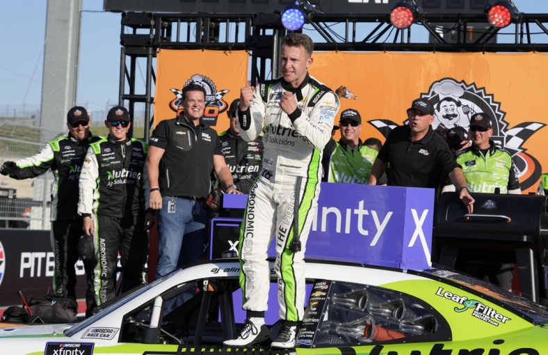Mar 26, 2022; Austin, Texas, USA; Xfinity Series driver AJ Allmendinger (16) reacts after winning the Pit Boss 250 at Circuit of the Americas. Mandatory Credit: Mike Dinovo-USA TODAY Sports