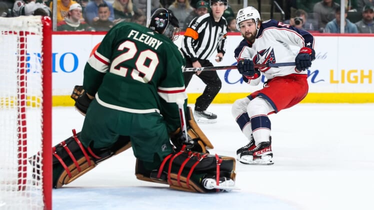 Mar 26, 2022; Saint Paul, Minnesota, USA; Minnesota Wild goaltender Marc-Andre Fleury (29) makes a save against Columbus Blue Jackets center Emil Bemstrom (52) in the first period at Xcel Energy Center. Mandatory Credit: David Berding-USA TODAY Sports