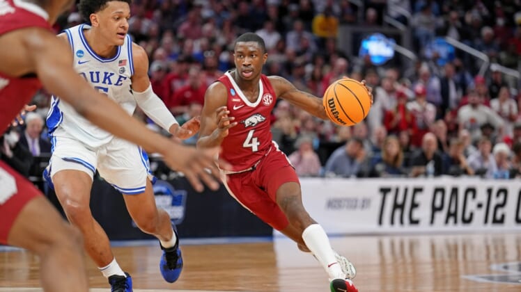 Mar 26, 2022; San Francisco, CA, USA; Arkansas Razorbacks guard Davonte Davis (4) dribbles the ball against Duke Blue Devils forward Paolo Banchero (5) during the first half in the finals of the West regional of the men's college basketball NCAA Tournament at Chase Center. Mandatory Credit: Kelley L Cox-USA TODAY Sports