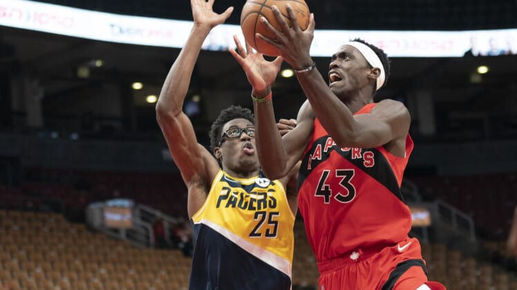Mar 26, 2022; Toronto, Ontario, CAN; Toronto Raptors forward Pascal Siakam (43) drives to the basket against Indiana Pacers forward Jalen Smith (25) during the third quarter at Scotiabank Arena. Mandatory Credit: Nick Turchiaro-USA TODAY Sports