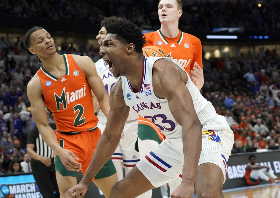 Mar 27, 2022; Chicago, IL, USA; Kansas Jayhawks forward David McCormack (33) reacts after a play during the second half against the Miami Hurricanes in the finals of the Midwest regional of the men's college basketball NCAA Tournament at United Center. Mandatory Credit: David Banks-USA TODAY Sports