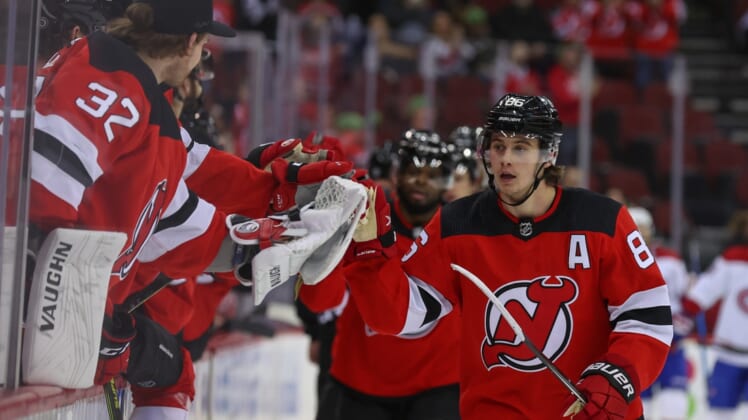 Mar 27, 2022; Newark, New Jersey, USA; New Jersey Devils center Jack Hughes (86) celebrates his goal against the Montreal Canadiens during the first period at Prudential Center. Mandatory Credit: Ed Mulholland-USA TODAY Sports