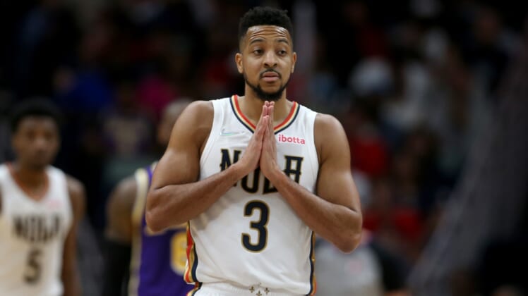 Mar 27, 2022; New Orleans, Louisiana, USA; New Orleans Pelicans guard CJ McCollum (3) gestures in the second half against the Los Angeles Lakers at the Smoothie King Center. The Pelicans won, 116-108. Mandatory Credit: Chuck Cook-USA TODAY Sports