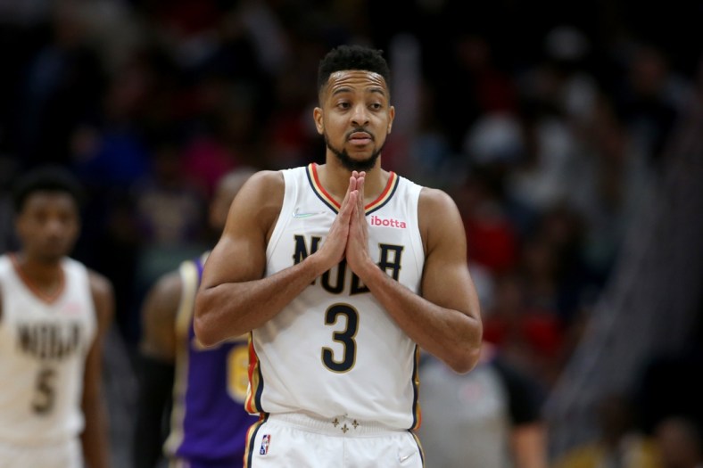 Mar 27, 2022; New Orleans, Louisiana, USA; New Orleans Pelicans guard CJ McCollum (3) gestures in the second half against the Los Angeles Lakers at the Smoothie King Center. The Pelicans won, 116-108. Mandatory Credit: Chuck Cook-USA TODAY Sports