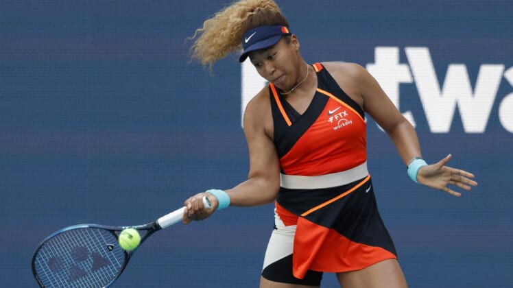 Mar 28, 2022; Miami Gardens, FL, USA; Naomi Osaka (JPN) hits a forehand against Alison Riske (USA)(not pictured) in a fourth round women's singles match in the Miami Open at Hard Rock Stadium. Mandatory Credit: Geoff Burke-USA TODAY Sports